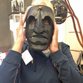 Cate puts on the mask